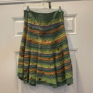 A line kneee length skirt.